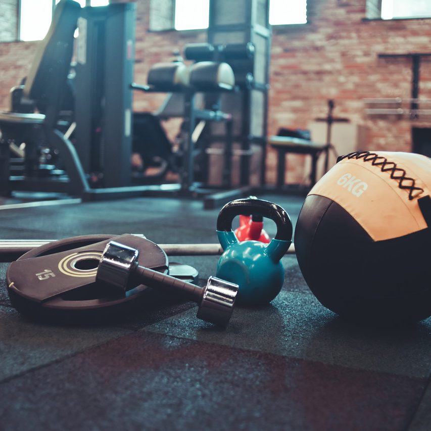 disassembled-barbell-medicine-ball-kettlebell-dumbbell-lying-floor-gym-sports-equipment-workout-with-free-weight-functional-training_Easy-Resize.com