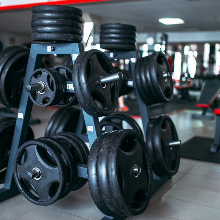 weights-bar-sport-equipment-gym-fitness-club-interior-bodybuilding-concept_Easy-Resize.com